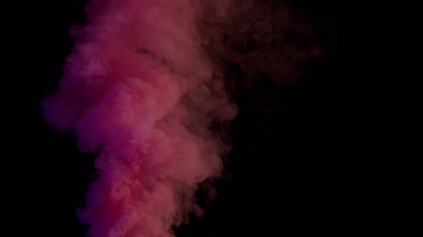 istock Colorful Smoke on Dark Background 1060383692