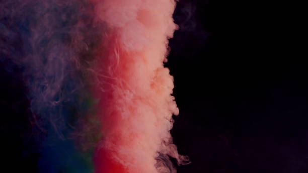 istock Colorful Smoke on Dark Background 1060383698