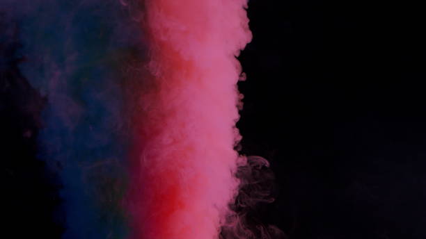 istock Colorful Smoke on Dark Background 1060383702