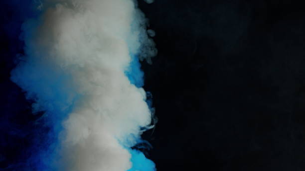 istock Colorful Smoke on Dark Background 1060383718