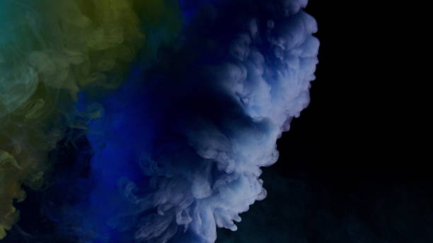 istock Colorful Smoke on Dark Background 1060383742