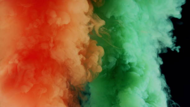 istock Colorful Smoke on Dark Background 1060383748