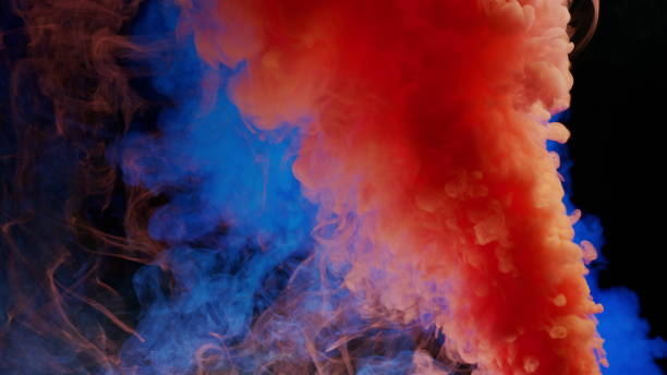 istock Colorful Smoke on Dark Background 1060383764