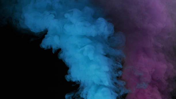 istock Colorful Smoke on Dark Background 1060383786
