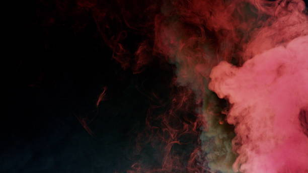 istock Colorful Smoke on Dark Background 1060383792