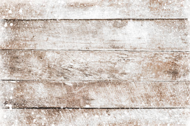 istock Old white wood texture with snow. 1060392370
