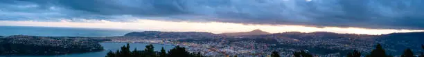 Photo of Panorama view, Beautiful cityscape after sunset. Nightlight. Dunedin, New Zealand.