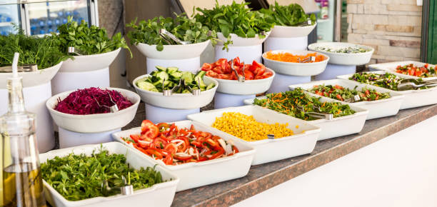 Salads Variety of fresh salads in a buffet buffet stock pictures, royalty-free photos & images