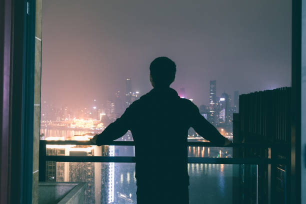 istock Young man looking city skyline in Chongqing 1060398216
