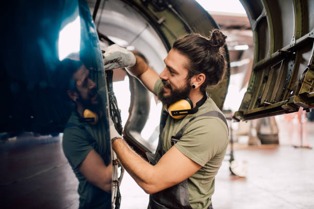 istock Mechanic repairing aircraft 1060400408
