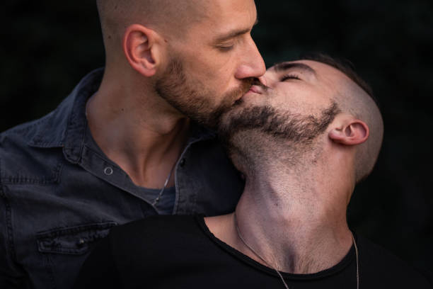 istock Handsome gay couple kissing 1060401044