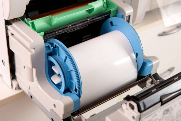 istock Used almost empty roll of photographic paper 1060401142