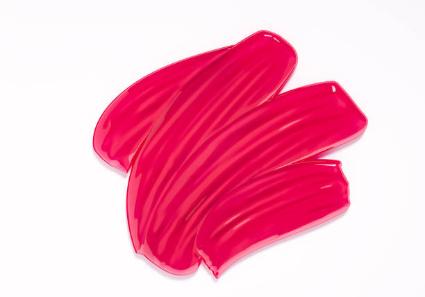 istock Pink vector lipstick smear. Female girly Paint brush stroke isolated on white 1060401324