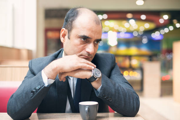 istock Businessman at cafe 1060402936