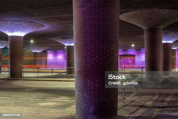 A Violet Illuminated Underpass Below An Highway Bridge In Copenhagen In Denmark 2 Stock Photo - Download Image Now