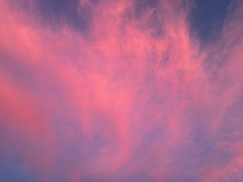 Pink and orange clouds at sunset