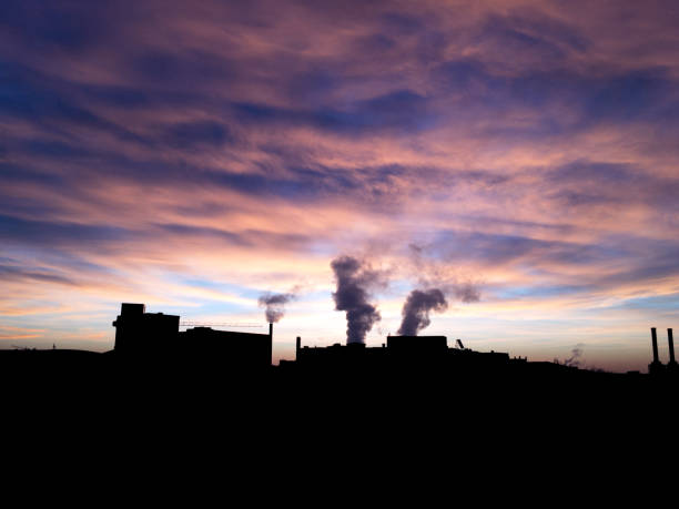 istock The sunset with silhouette of buildings 1060411976