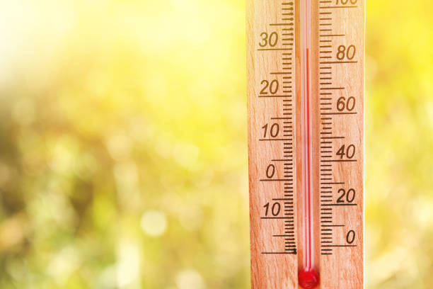 istock Thermometer displaying high 30 degree hot temperatures in sun summer day. 1060411980