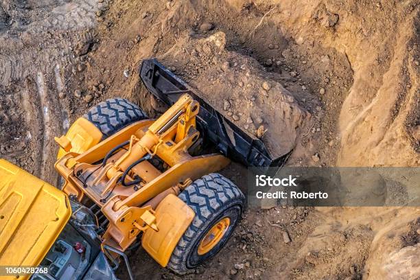 Excavator At Work Stock Photo - Download Image Now - Backhoe, Archaeology, Digging