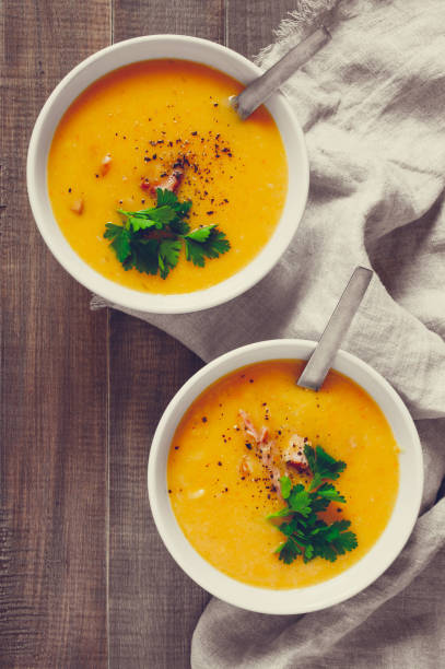 istock Two portion of pea soup with smoked meat and parsley 1060433064
