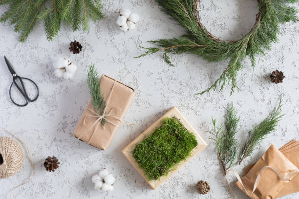 istock Christmas composition. Christmas gift, pine cones, fir branches on white background. Flat lay, top view, copy space. Preparing for the new year 1060435180