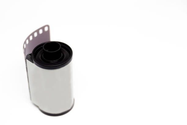 135 negative black and white film roll close up, isolated on white background.