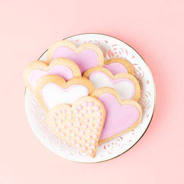 istock Valentine's day cookies close up on pink background. 1060447664