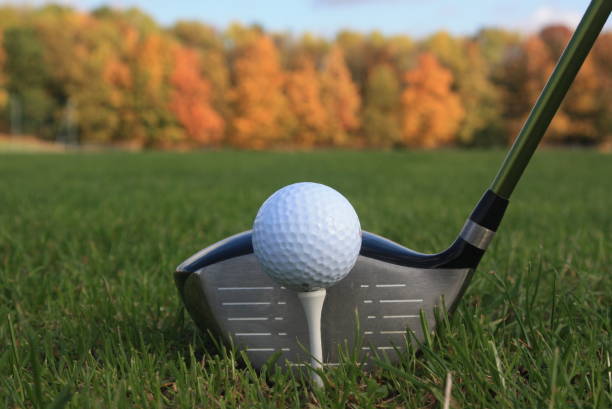 istock Golf course in autumn  Driver  Golf ball on a tee 1060454860