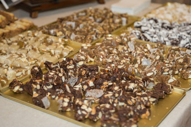 istock Slices of Cake stuffed with Almonds on a Tray 1060459988