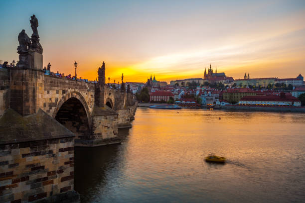 istock Prague castle and Charles bridge at sunset, Czech republic 1060461610
