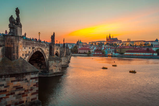 istock Prague castle and Charles bridge at sunset, Czech republic 1060461614