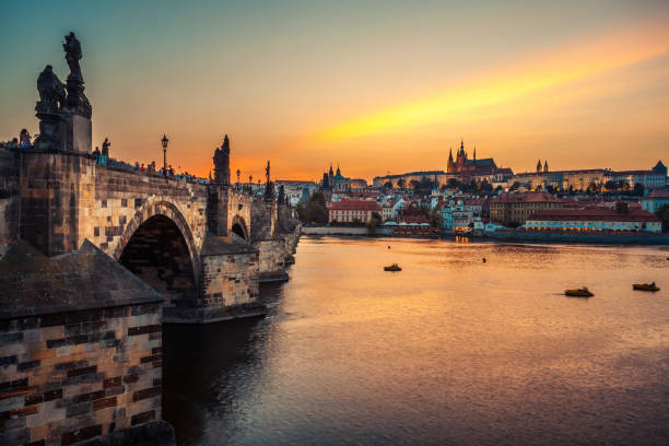 istock Prague castle and Charles bridge at sunset, Czech republic 1060461620