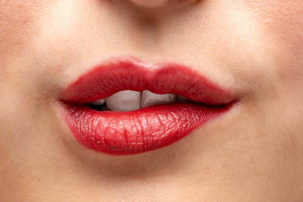 istock Beautiful Woman with red lips 1060468848