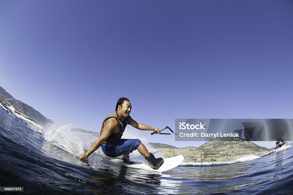 Japanese man wakeboarding  Wakeboarding Stock Photo