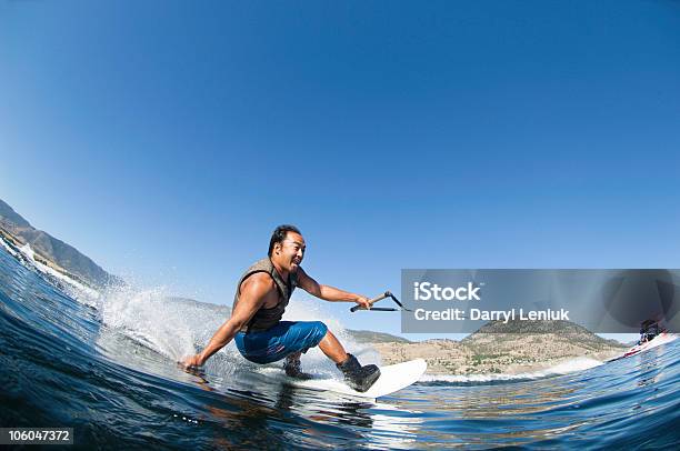Japanese Man Wakeboarding Stock Photo - Download Image Now - Wakeboarding, Adventure, Summer