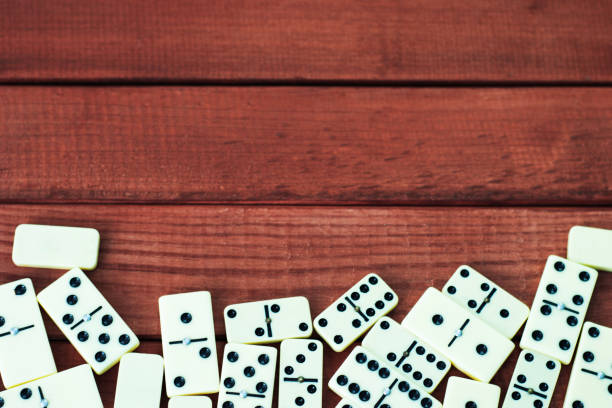 istock Dominoes on the table with a background 1060474266