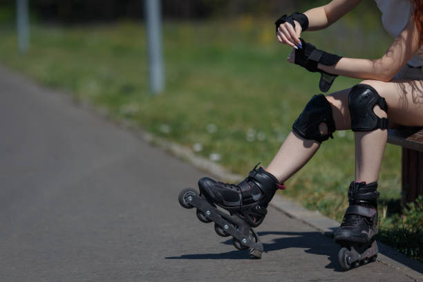 istock Beautiful young girl roller skating 1060474278