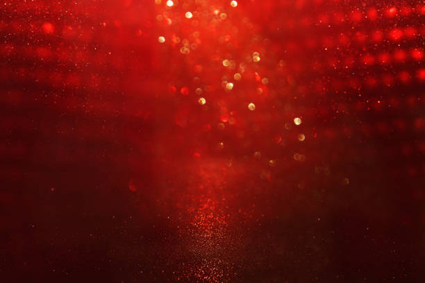 istock abstract background of red bokeh lights. 1060474832