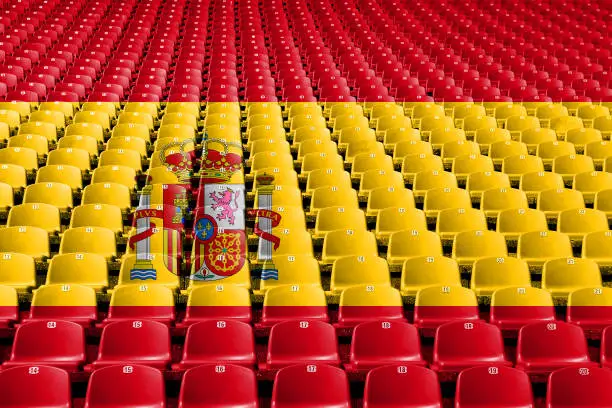 Photo of Spain flag stadium seats. Sports competition concept.