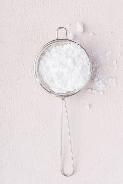 Icing sugar isolated on stone background powdered sugar stock pictures, royalty-free photos & images