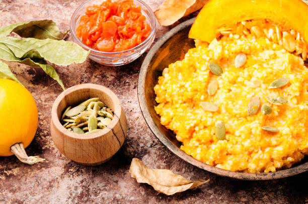 istock Pumpkin porridge and pumpkins 1060493590