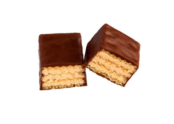 istock Chocolate candy with filling isolated on a white. Chocolate wafer candies. 1060496000