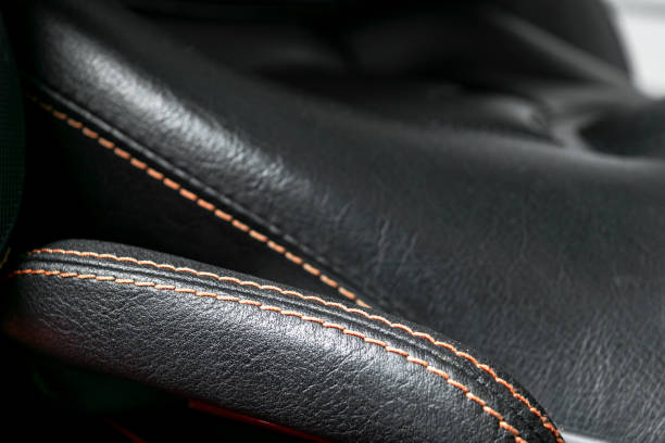 istock Car inside. Interior of a car. Comfortable leather seats. Perforated leather. Car interior details. Car detailing 1060496854