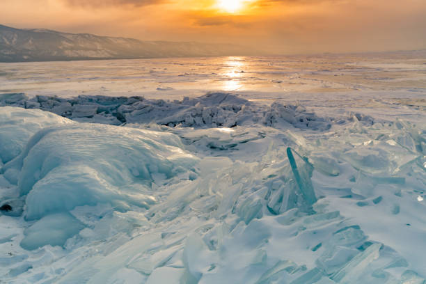 istock Freeze water Baikal lake with sunrise sky background 1060500320