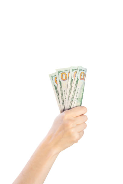istock Woman hand holding dollars banknote on a white background isolate 1060502260
