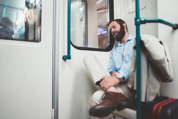 istock Businessman sleeping in the subway train 1060506286
