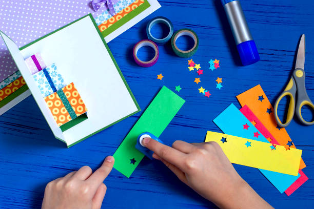 istock Child makes a card for Christmas. Step 10 1060507492
