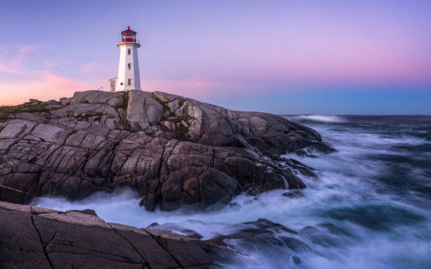 istock Peggys Cove Lighthouse with waves 1060510662
