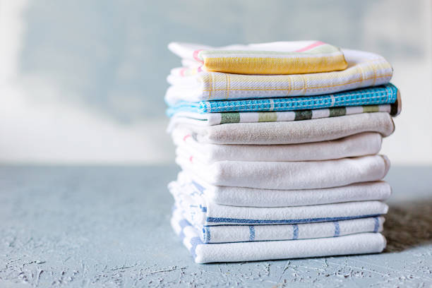 istock Pile of cotton kitchen napkins on grey background 1060510746
