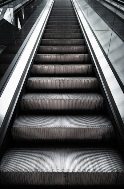 istock Easy challenging road to success concept escalator climb 1060512664